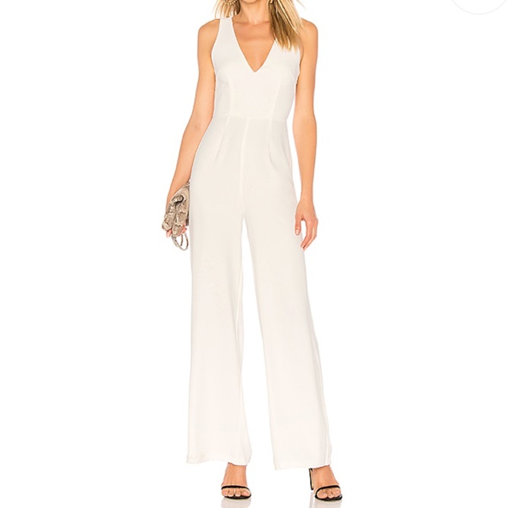 CARMELA DEEP V WIDE LEG BACKLESS JUMPSUIT IN WHITE